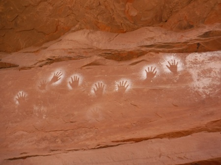 white hand pictographs in San Juan county, Utah. Photo by Gerald Trainor.